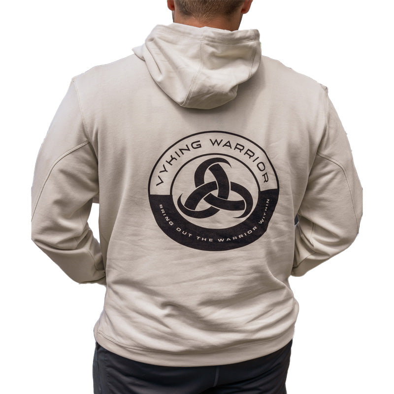 Beige hoodie featuring a bold Vyking warrior logo, highlighting strength and modern streetwear style.